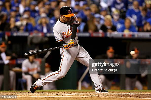 Hardy of the Baltimore Orioles bats in the second inning against Jeremy Guthrie of the Kansas City Royals during Game Three of the American League...