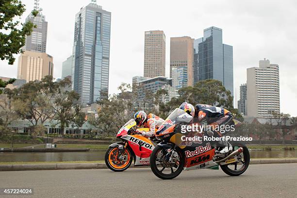Australian Moto 3 rider Jack Miller and Spanish Moto GP rider Dani Pedrosa perform ride during a bike run on Yarra River on October 15, 2014 in...