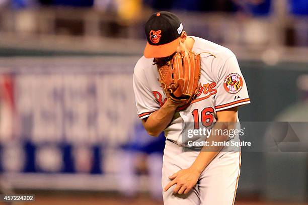 Wei-Yin Chen of the Baltimore Orioles reacts after Alex Gordon of the Kansas City Royals hit a grounder out to second base in the fourth inning to...