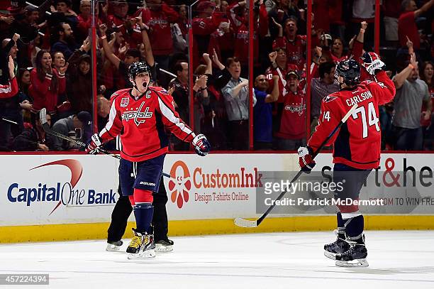 Alex Ovechkin celebrates with John Carlson of the Washington Capitals celebrates after scoring a goal in the third period against the San Jose Sharks...