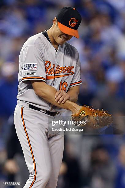 Wei-Yin Chen of the Baltimore Orioles walks back to the dugout after being relieved in the sixth inning against the Kansas City Royals during Game...