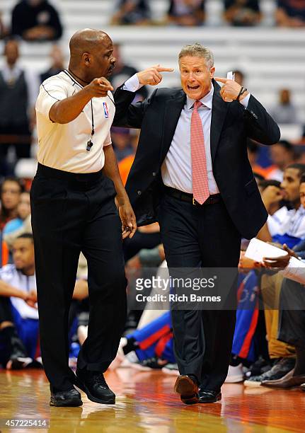 Head coach Brett Brown of the Philadelphia 76ers reacts to a call during a preseason game at the Carrier Dome on October 14, 2014 in Syracuse, New...
