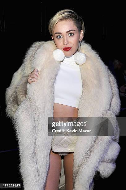 Miley Cyrus poses backstage at Hot 99.5s Jingle Ball 2013, presented by Overstock.com, at Verizon Center on December 16, 2013 in Washington, D.C.