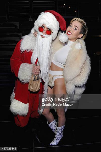 Miley Cyrus poses backstage at Hot 99.5s Jingle Ball 2013, presented by Overstock.com, at Verizon Center on December 16, 2013 in Washington, D.C.
