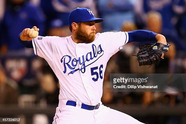 Greg Holland of the Kansas City Royals throws a pitch in the ninth inning against the Baltimore Orioles during Game Three of the American League...