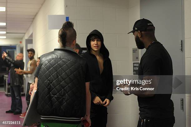 Singer Austin Mahone poses backstage at Hot 99.5s Jingle Ball 2013, presented by Overstock.com, at Verizon Center on December 16, 2013 in...