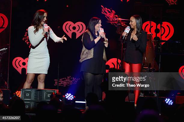 Hot 99.5's Elizabethany, Melanie and Danni perform onstage during Hot 99.5s Jingle Ball 2013, presented by Overstock.com, at Verizon Center on...
