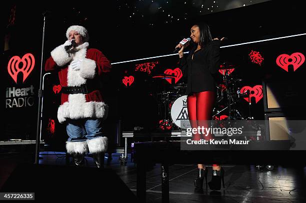 Hot 99.5's Toby Knap and Danni perform onstage during Hot 99.5s Jingle Ball 2013, presented by Overstock.com, at Verizon Center on December 16, 2013...