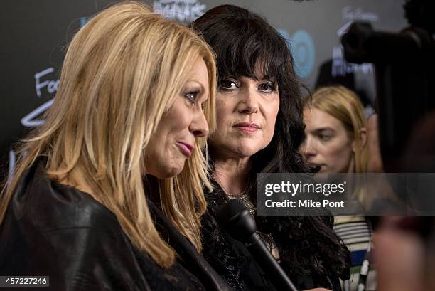 Nancy Wilson and Ann Wilson of the band Heart attend the "Foo Fighters: Sonic Highways" New York Premiere at Ed Sullivan Theater on October 14, 2014...