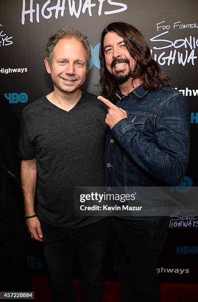 Producer Rob Burnett and Dave Grohl attend the premiere of Foo Fighters "Sonic Highways" at the Ed Sullivan Theater on October 14, 2014 in New York...