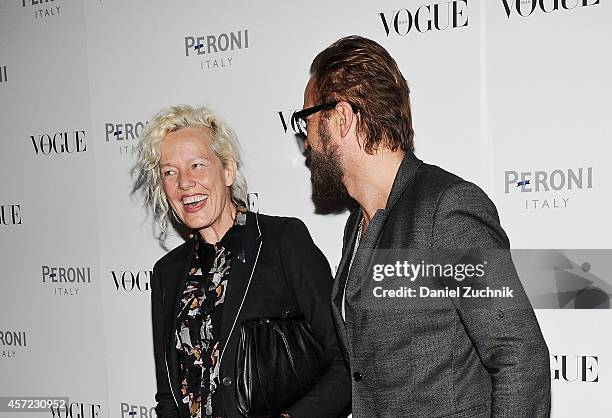 Photographer Ellen Von Unwerth and fashion designer Johan Lindeberg attend The Visionary World of Vogue Italia Exhibition Opening Night presented by...