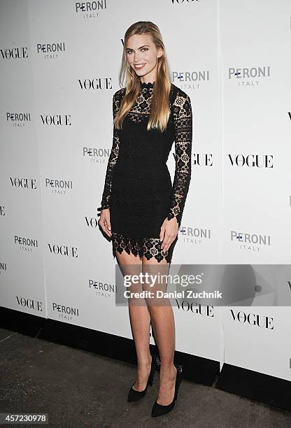 Model Emily Senko attends The Visionary World of Vogue Italia Exhibition Opening Night presented by Peroni Nastro Azzurro at Industria Studios on...