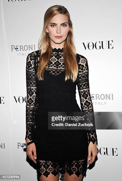 Model Emily Senko attends The Visionary World of Vogue Italia Exhibition Opening Night presented by Peroni Nastro Azzurro at Industria Studios on...