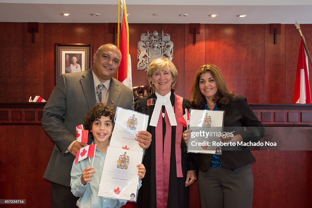 Hispanic family becomes Canadian citizens.Canadian...