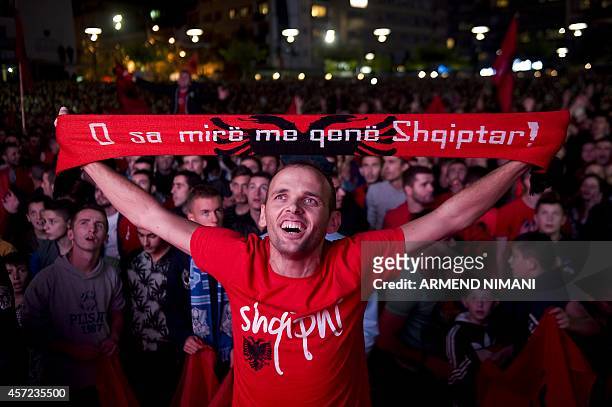 An Albania supporter cheers for his team in Pristina during the UEFA Euro 2016 qualifying football match between Serbia and Albania in Belgrade...