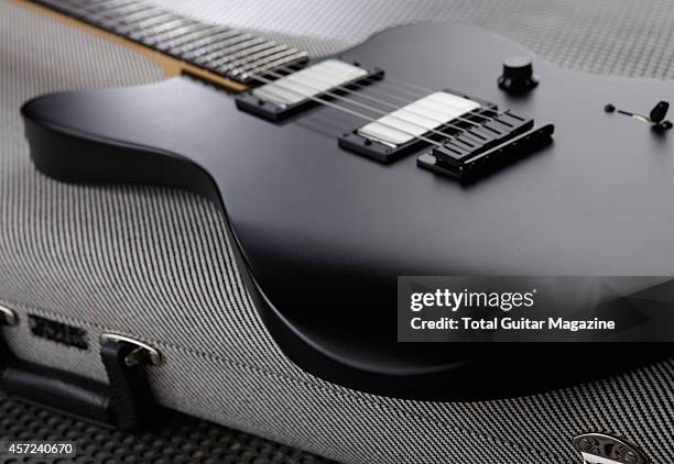 Detail of the mahogany body of a Fender Jim Root Jazzmaster electric guitar, taken on March 6, 2014.