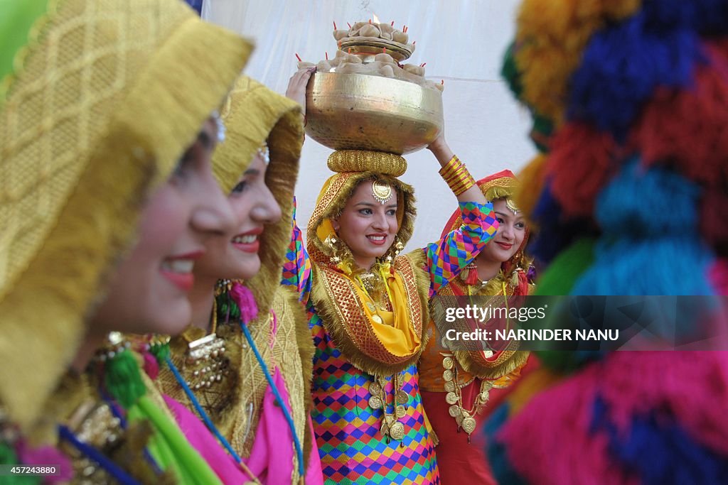 Indian college girls wear traditional Punjabi dress as they wait to... News Photo - Getty Images Indian college girls wear traditional Punjabi dress as they wait to... News Photo - Getty Images