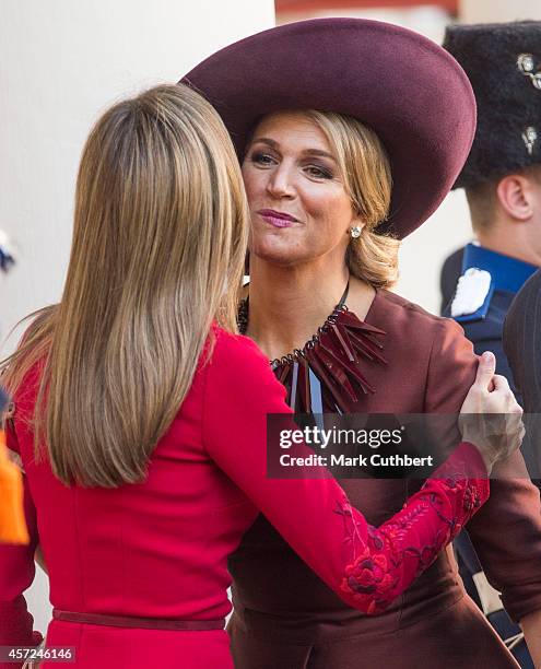 Queen Maxima of the Netherlands and Queen Letizia of Spain at The Noordeinde Palace on October 15, 2014 in The Hague, Netherlands.