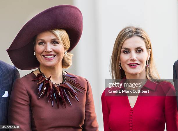 Queen Maxima of the Netherlands and Queen Letizia of Spain at The Noordeinde Palace on October 15, 2014 in The Hague, Netherlands.