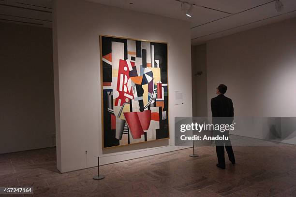 Visitor looks at the art works during the press preview for "Cubism: The Leonard A. Lauder Collection" exhibition which opens on October 20, 2014...