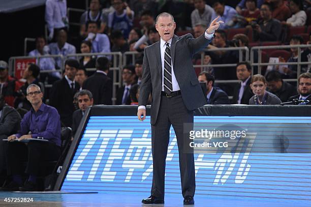 Head Coach Michael Malone of the Sacramento Kings speaks to his players during the game between the Brooklyn Nets and the Sacramento Kings as part of...