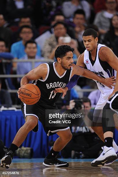 Jorge Gutierrez of the Brooklyn Nets drives the ball against Ray McCallum of the Sacramento Kings during the game between the Brooklyn Nets and the...