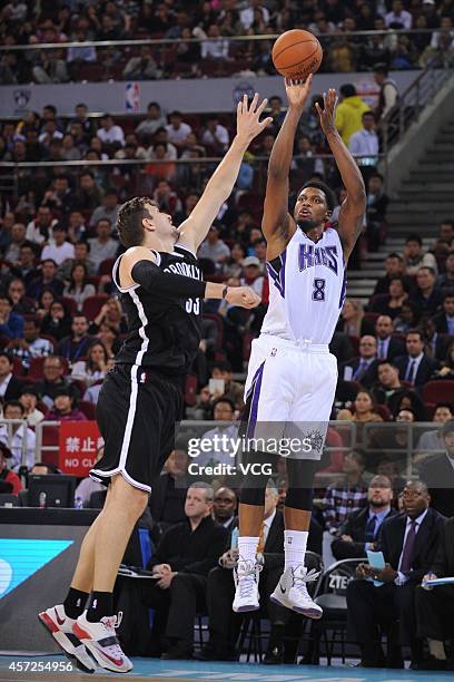 Rudy Gay of the Sacramento Kings shoots against Mirza Teletovic of the Brooklyn Nets during the game between the Brooklyn Nets and the Sacramento...