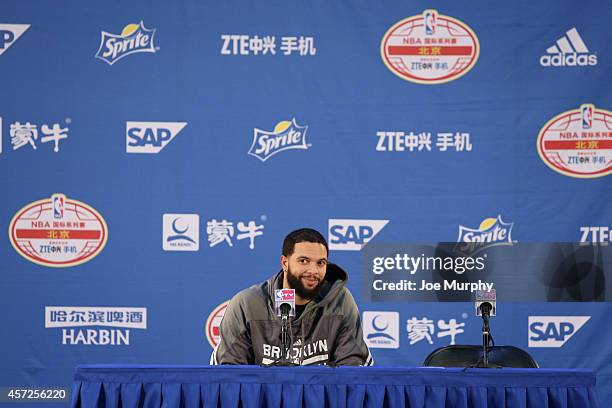 Deron Williams of the Brooklyn Nets speaks to the media after the game against the Sacramento Kings as part of the 2014 NBA Global Games at the...