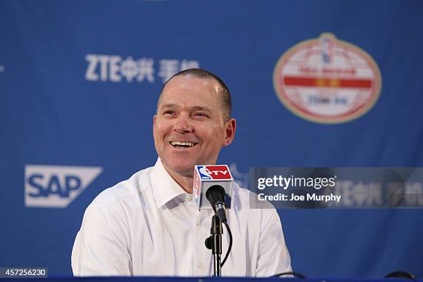 Head Coach Michael Malone of the Sacramento Kings speaks to the media after the game against the Brooklyn Nets as part of the 2014 NBA Global Games...