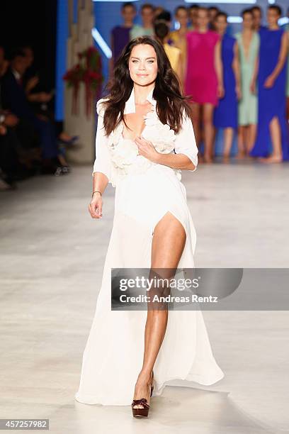 Model Ebru Salli walks the runway at the Ayse Deniz Yegin show during Mercedes Benz Fashion Week Istanbul SS15 at Antrepo 3 on October 15, 2014 in...