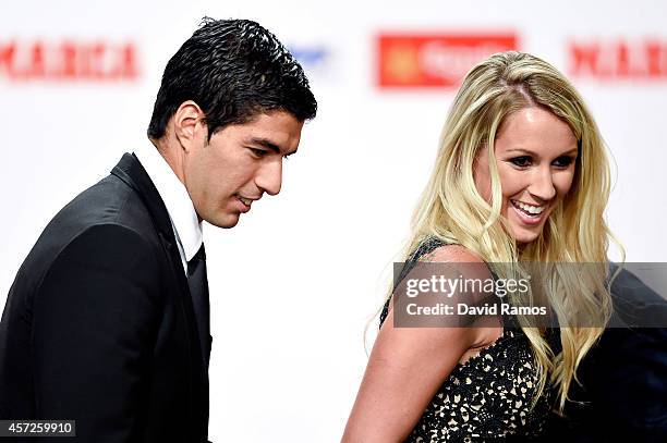 Luis Suarez and his wife Sofia Balbi arrive to the Golden Boot Awards Ceremony on October 15, 2014 in Barcelona, Spain. Luis Suarez scored 31 goals...