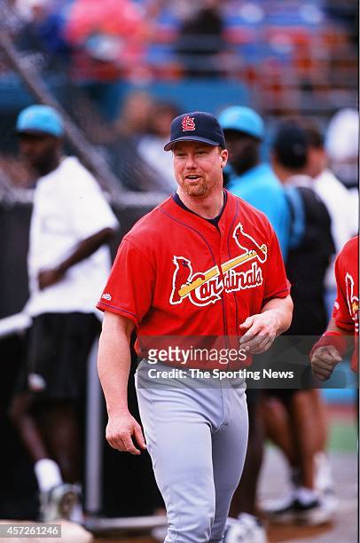 Mark McGwire of the St. Louis Cardinals looks on against the Florida Marlins at Sun Life Stadium on September 1, 1998 in Miami, Florida.
