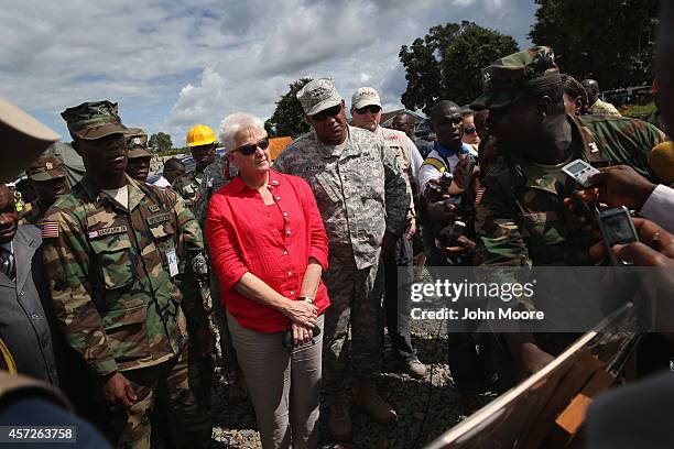 Liberian Brig. Gen. Daniel Ziankhan, chief of staff for the Armed Forces of Liberia , U.S. Ambassador to Liberia Deborah Malac and American Maj. Gen....