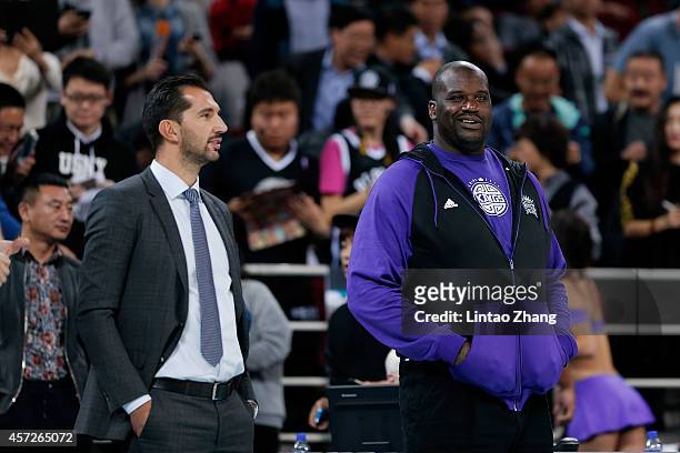 Legends Shaquille O'Neal with Peja Stojakovic stand together during the 2014 NBA Global Games match between the Brooklyn Nets and Sacramento Kings at...