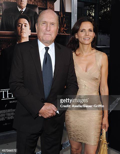 Actor Robert Duvall and wife Luciana Pedraza arrive at the Los Angeles Premiere of 'The Judge' at AMPAS Samuel Goldwyn Theater on October 1, 2014 in...