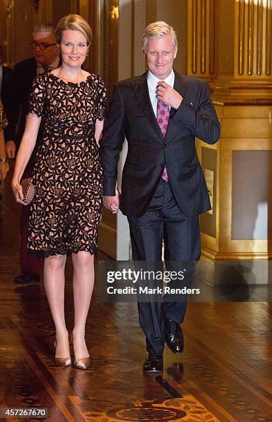 Queen Mathilde and King Philippe of Belgium assist the Autumn Concert at the Royal Palace on October 15, 2014 in Brussels, Belgium.