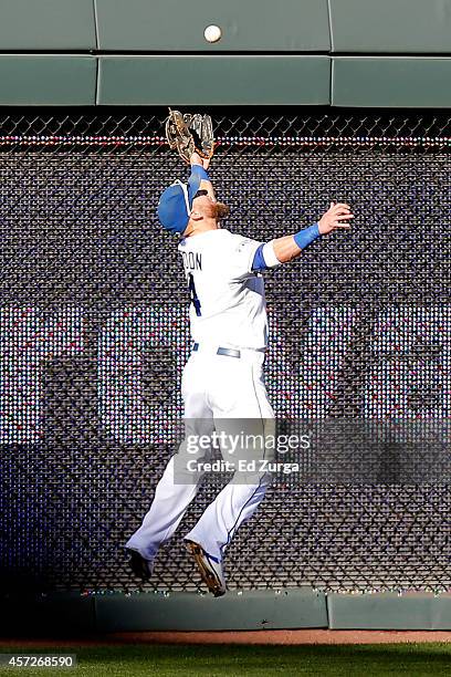 Alex Gordon of the Kansas City Royals catches a pop up fly ball hit by J.J. Hardy of the Baltimore Orioles in the fifth inning during Game Four of...