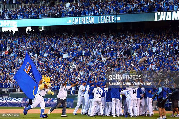 The Kansas City Royals celebrate their 2 to 1 win over the Baltimore Orioles to sweep the series in Game Four of the American League Championship...