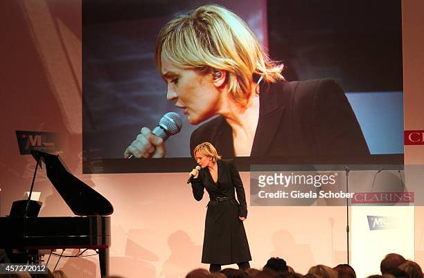 Patricia Kaas performs during the Prix Courage Award 2014 on October 15, 2014 at Allerheiligen-Hofkirche in Munich, Germany.