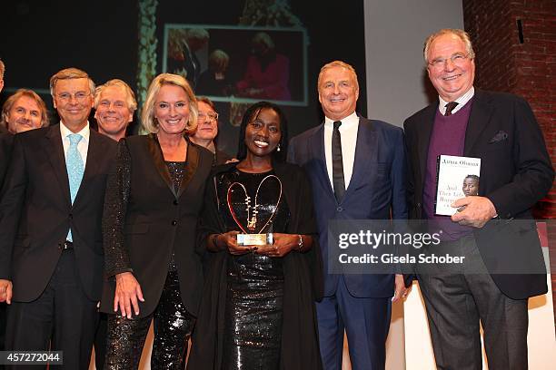 Wolfgang Bosbach, Sibylle Bassler, Auma Obama, founder 'Sauti Kuu' , Christian Courtin - Clarins, CEO Clarins, Friedrich von Thun attend the Prix...