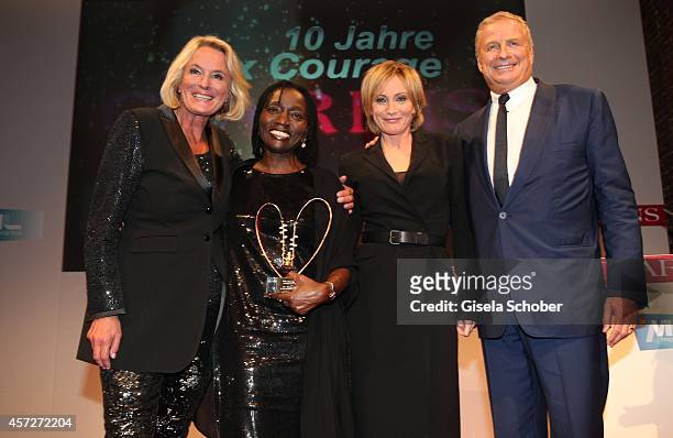 Sibylle Bassler, Mona Lisa, Patricia Kaas, Auma Obama, founder 'Sauti Kuu' , Christian Courtin - Clarins, CEO Clarins attend the Prix Courage Award...