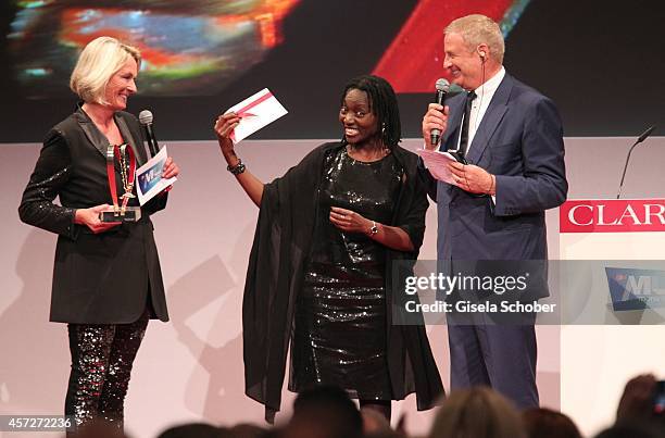 Sibylle Bassler, Mona Lisa, Auma Obama, founder 'Sauti Kuu' and Christian Courtin - Clarins, CEO Clarins attend the Prix Courage Award 2014 on...