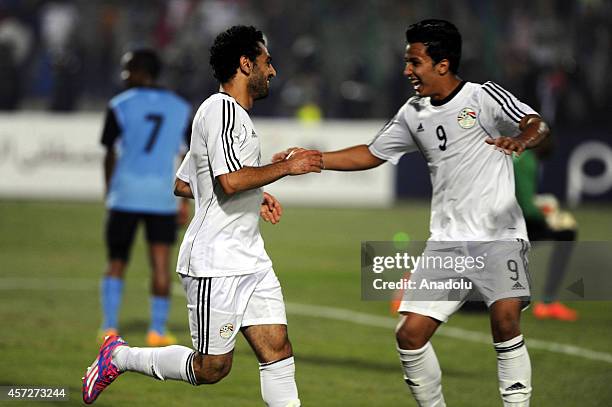 Mohammed Salah and Amr Gamal of Egypt celebrate the goal during the 2015 Africa Cup of Nations Group G qualifying football match between Egypt and...