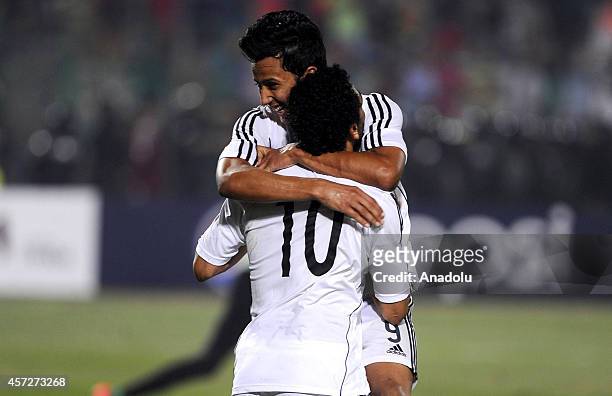 Mohammed Salah and Amr Gamal of Egypt celebrate the goal during the 2015 Africa Cup of Nations Group G qualifying football match between Egypt and...