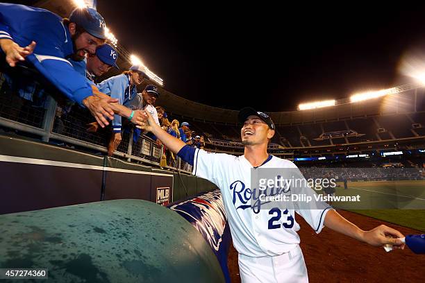 Norichika Aoki of the Kansas City Royals celebrates after their 2 to 1 win over the Baltimore Orioles to sweep the series in Game Four of the...