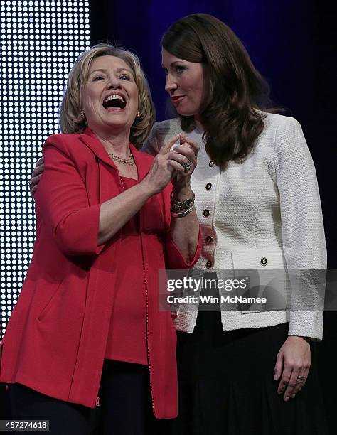 Former U.S. Secretary of State Hillary Clinton campaigns with U.S. Senate Democratic candidate and Kentucky Secretary of State Alison Lundergan...