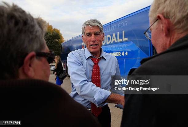 Sen. Mark Udall greets supporters as he kicks off his 'Mark Your Ballot' bus tour on October 15, 2014 in Denver, Colorado. Udall is running for...