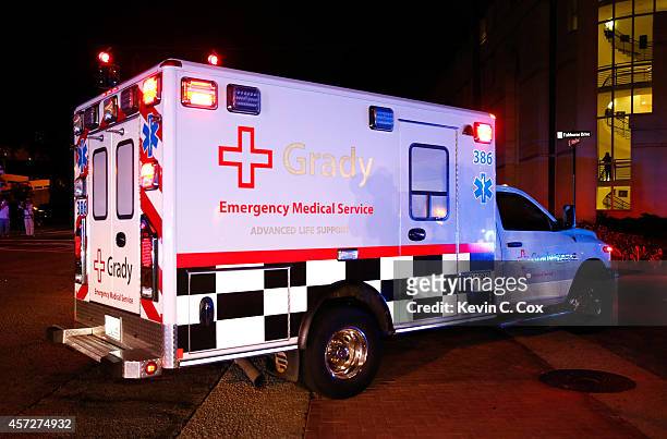 Ebola patient Amber Vinson arrives by ambulance at Emory University Hospital on October 15, 2014 in Atlanta, Georgia. Nurse Amber Vinson joins Nina...