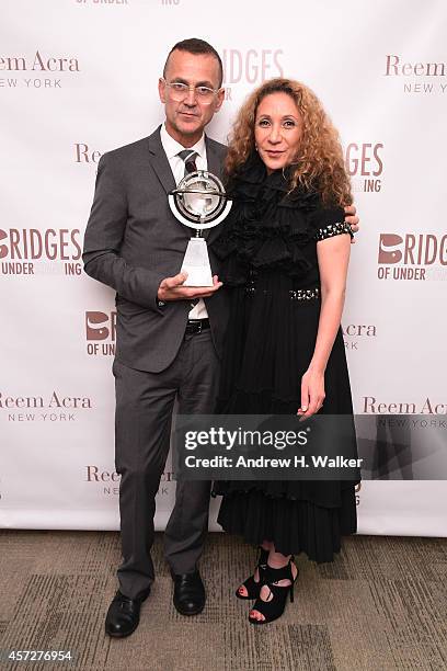 Steven Kolb and designer Reem Acra attend Bridges Of Understanding's annual "Building Bridges" award dinner honoring designer Reem Acra with Steven...