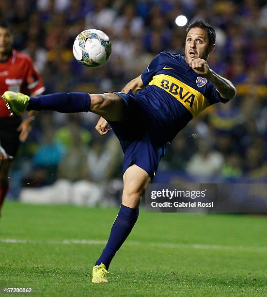 Juan Martinez of Boca Juniors kicks the ball during a match between Boca Juniors and Deportivo Capiata as part of round of 16 of Copa Total...